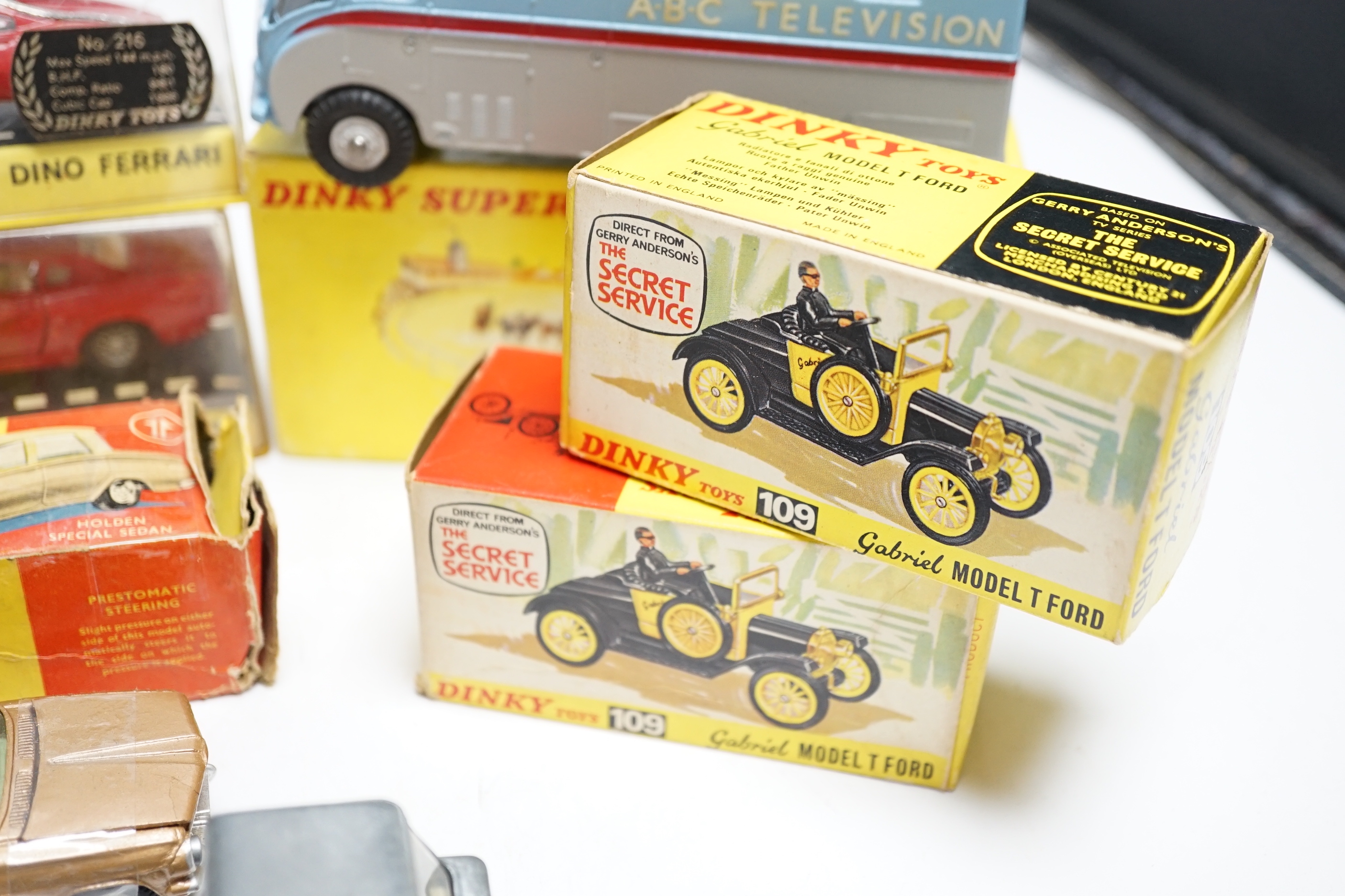 Eight boxed Dinky Toys including two (109) Gabriel Model T Fords, (987) ABC TV Mobile Control Room, (200) Matra 630, (116) Volvo 1800S, (216) Ferrari Dino, (196) Holden Special Sedan, (451) Johnston Road Sweeper, plus an